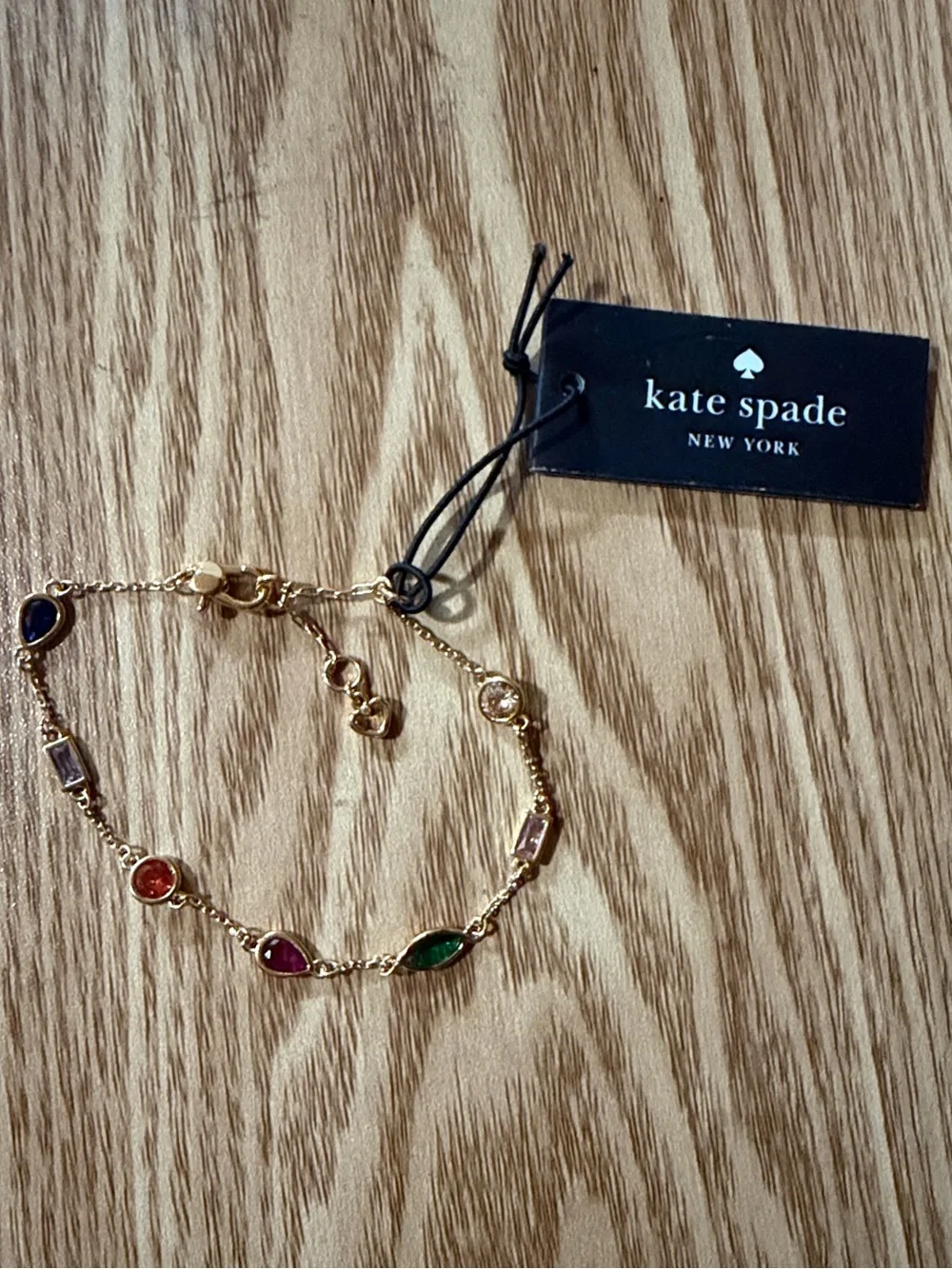 Kate Spade Gold Bracelet with Blue, Green, Pink and Champagne Stones